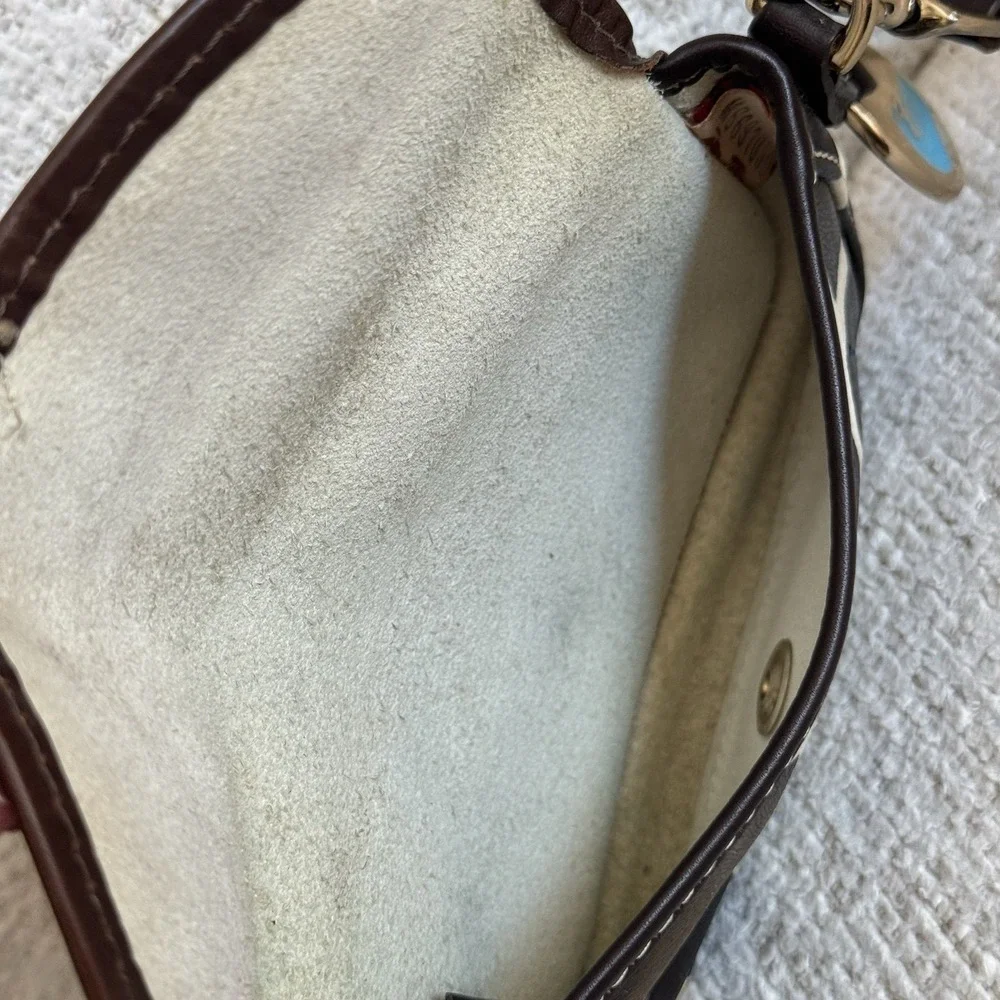 Dooney & Bourke Giraffe Print Haircalf Leather Flap Wristlet Bag Blue Logo Charm